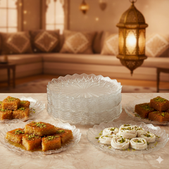 Desserts on plates with a decorative bowl in the center, set against a cozy living room background.
