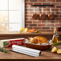 A roll of aluminium foil next to its packaging box with 'Fun' brand branding.