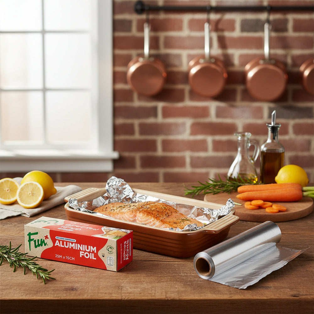 A roll of Fun® brand aluminium foil next to its packaging box, indicating dimensions of 15cm x 25m.