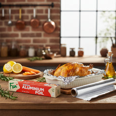 Packaging and roll of Fun brand aluminium foil, with product information and branding visible.