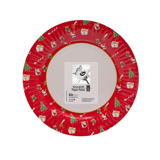 A red paper plate with Christmas-themed patterns including trees and presents.