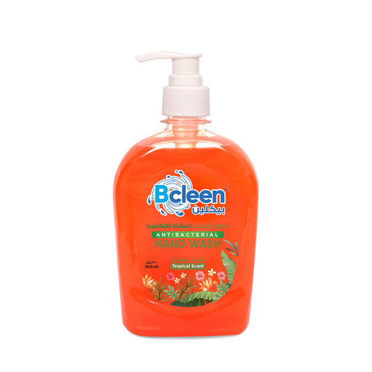 A plastic bottle of Bcleen Antibacterial Hand Wash with Moisturizer Tropical Scent, 500ml, with a pump dispenser.