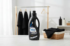 A black bottle of Bcleen Abaya Wash Shampoo with a label showing the brand name, product name, and a depiction of a white abaya.