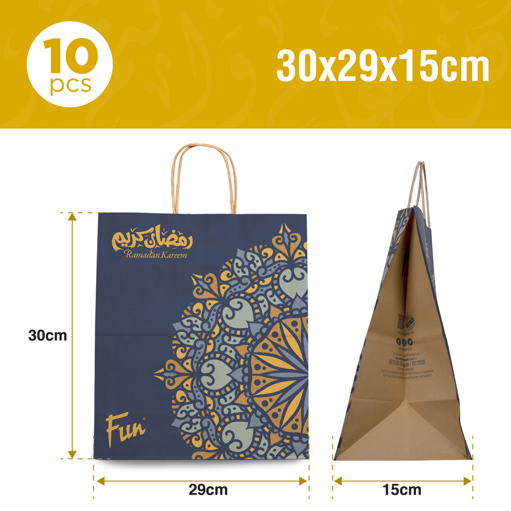 A pair of brown paper carry bags with twisted handles and decorative Ramadan-themed prints in gold and blue colors.